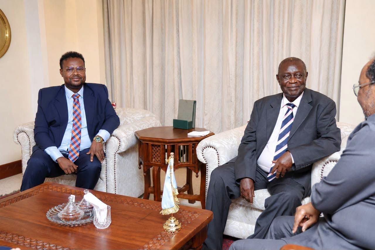 Oketch Salah in a high-level meeting